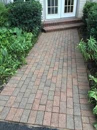 Brick paver walkway to French doors