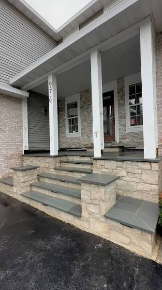 Stone porch steps with bluestone treads